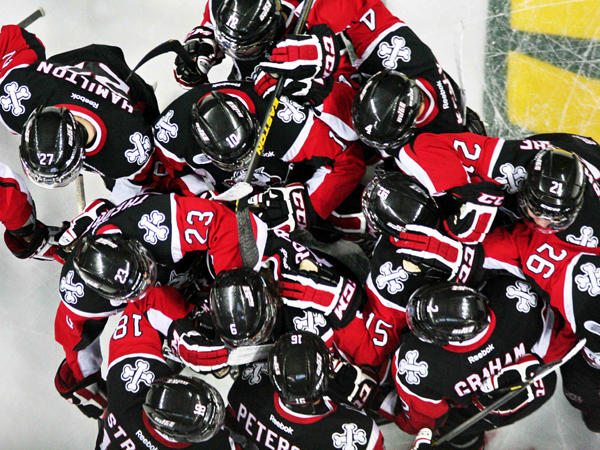 SNAPSHOT - Niagara IceDogs celebrate OT win over Windsor Spitfires