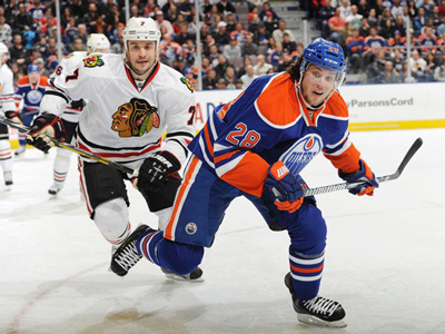 Hawks barely break a sweat in easy win over Oilers