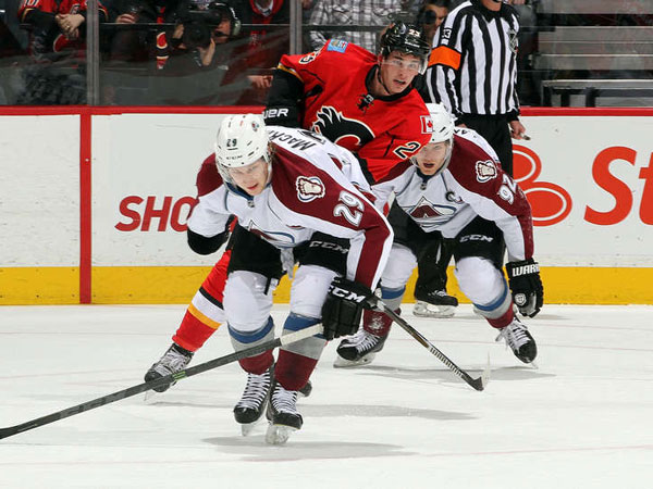 Flames tie game late, top Avalanche in OT